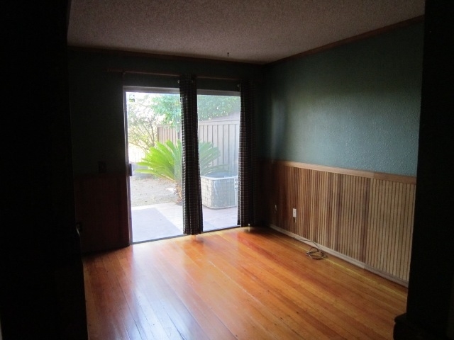 2807 Ledgetop Place Spring Valley, CA 91977 - Photo 10 of 23 Downstairs bedroom with a slider to the back yard