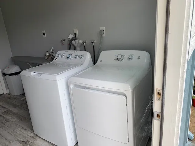 a utility room with dryer and washer