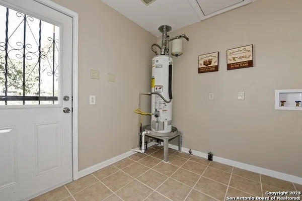 a room with gym equipment and windows