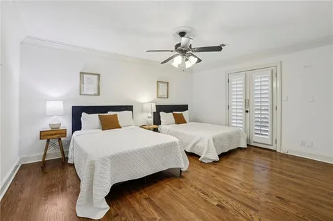 a spacious bathroom with a sink a mirror and a bathtub