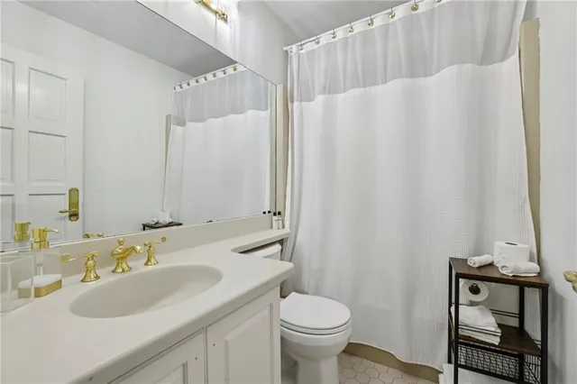 a view of a hallway view with wooden floor and staircase