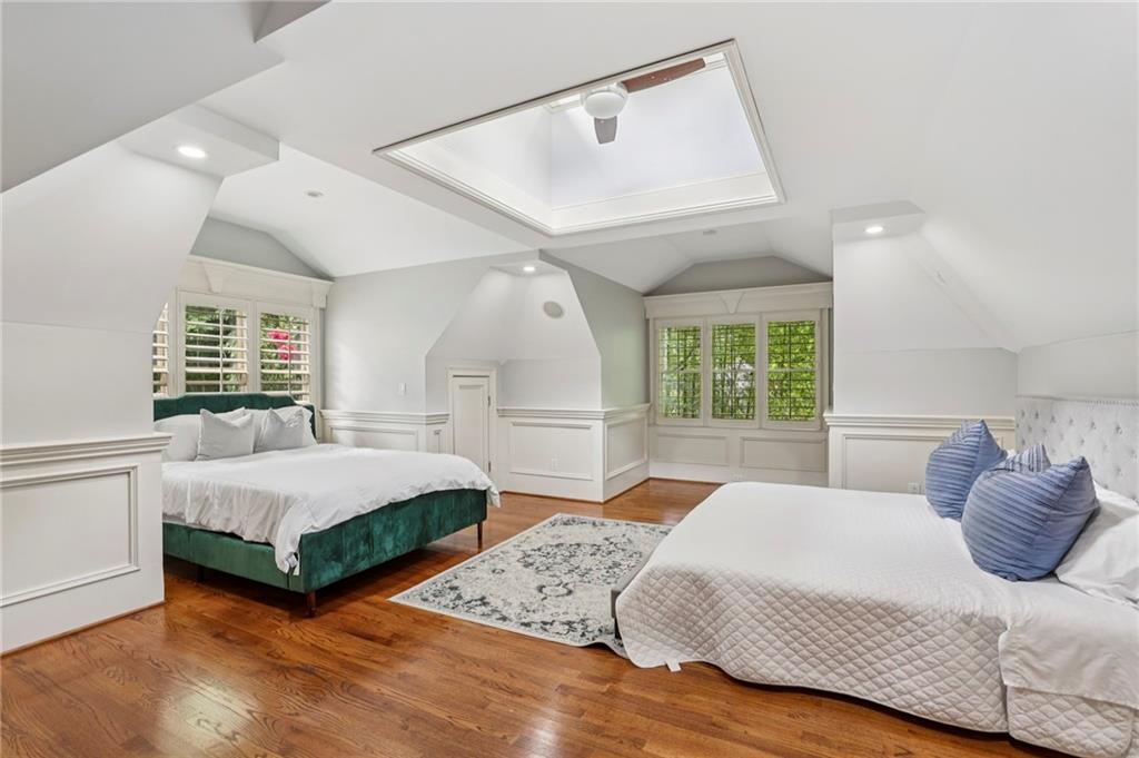 13039 Freemanville Road Alpharetta, GA 30004 - Photo 39 of 62 a bedroom with a bed window and couch