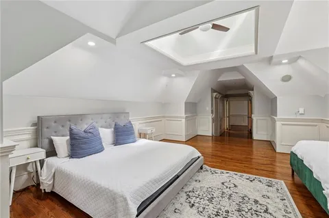a view of a porch with furniture and floor to ceiling window