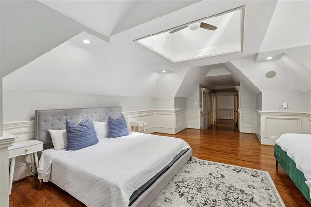a view of a porch with furniture and floor to ceiling window