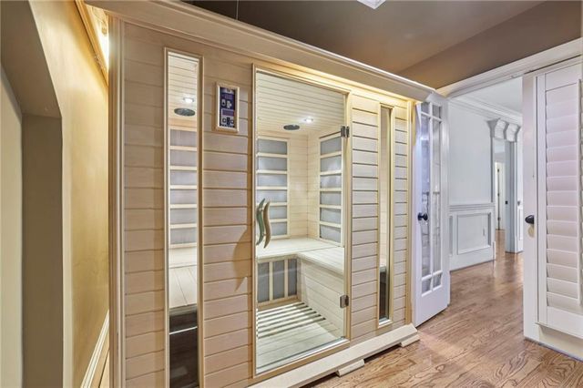 a front view of a house with a yard table and chairs