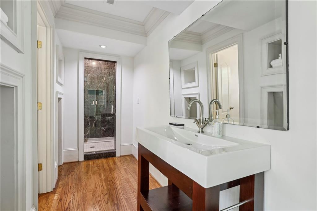 13039 Freemanville Road Alpharetta, GA 30004 - Photo 44 of 62 a bathroom with a sink and a mirror