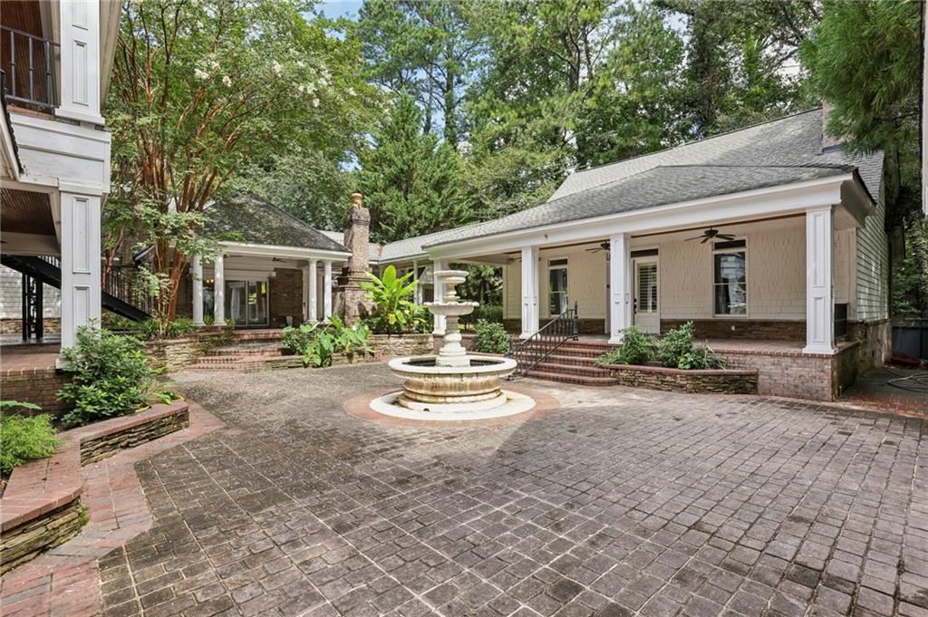 13039 Freemanville Road Alpharetta, GA 30004 - Photo 55 of 62 a view of a house with backyard and sitting area