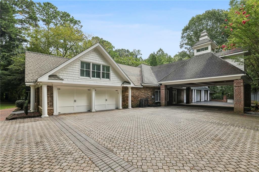 13039 Freemanville Road Alpharetta, GA 30004 - Photo 61 of 62 a front view of a house with a yard