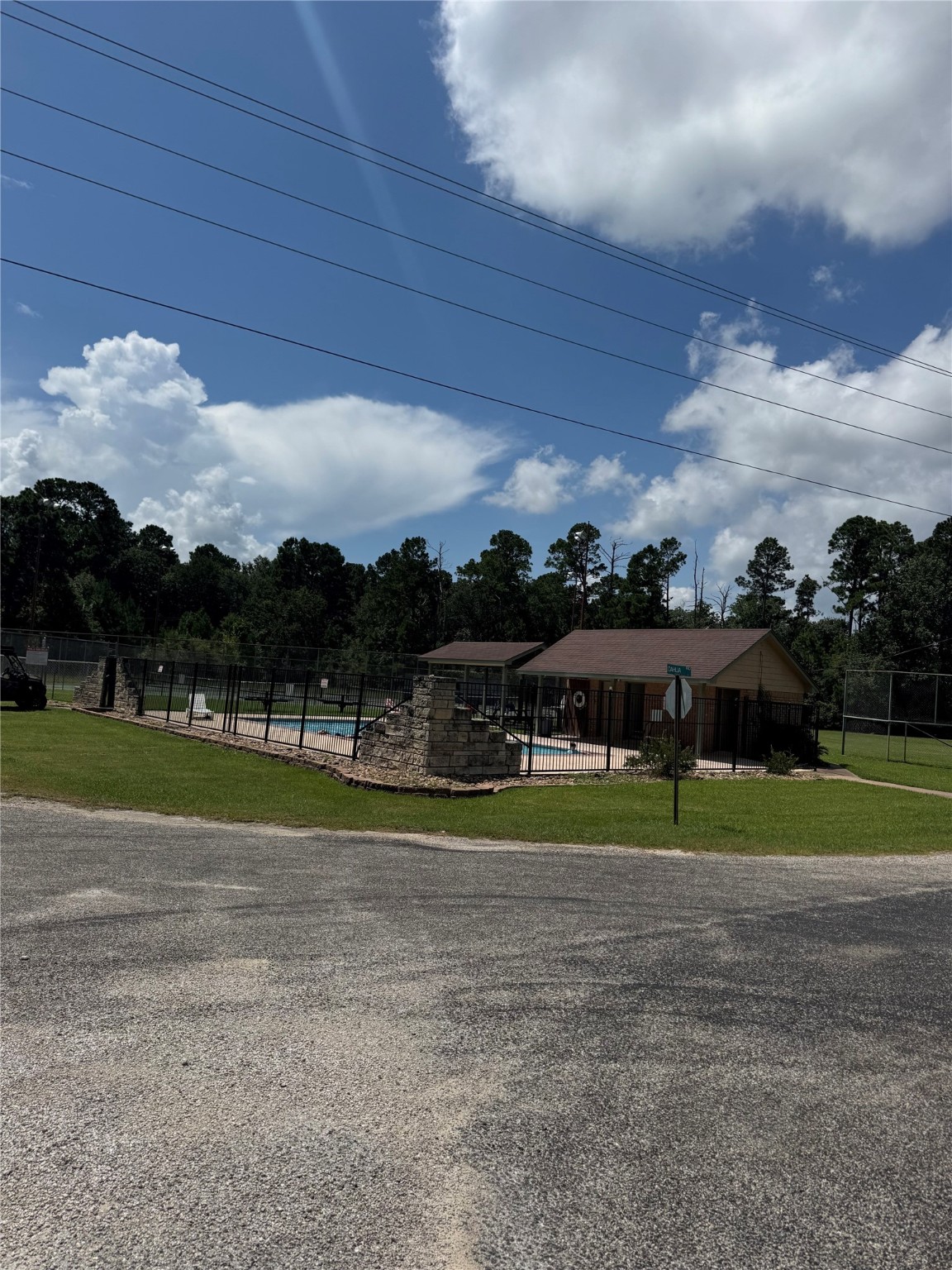 Lot 2 Dahlia Road Huntsville, TX 77320 - Photo 6 of 6 Neighborhood pool and tennis court.