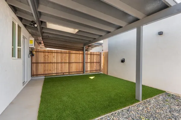 a view of a backyard of a house