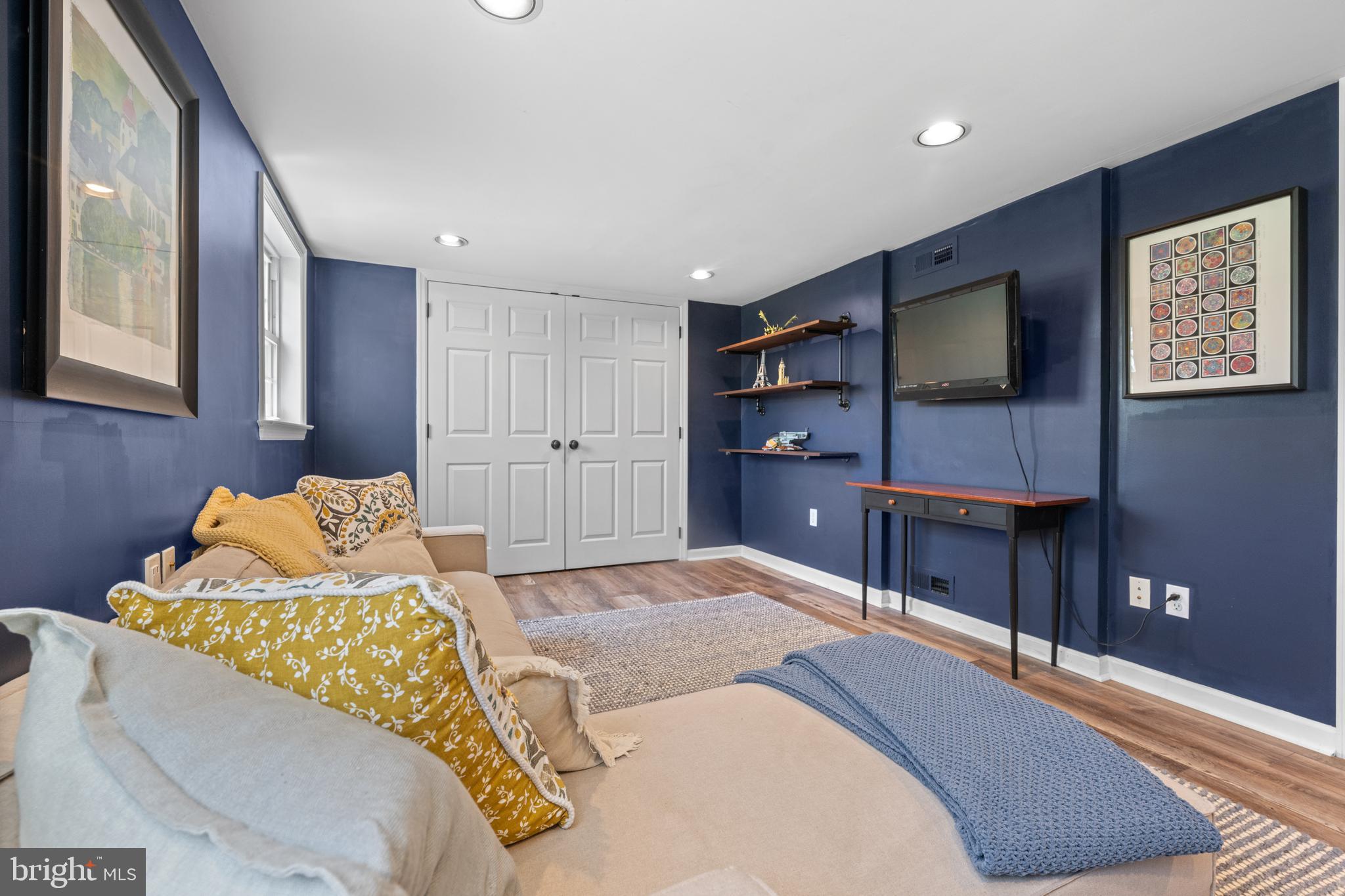 207 Anthony Wayne Drive Wayne, PA 19087 - Photo 15 of 47 a bedroom with a bed and a flat screen tv