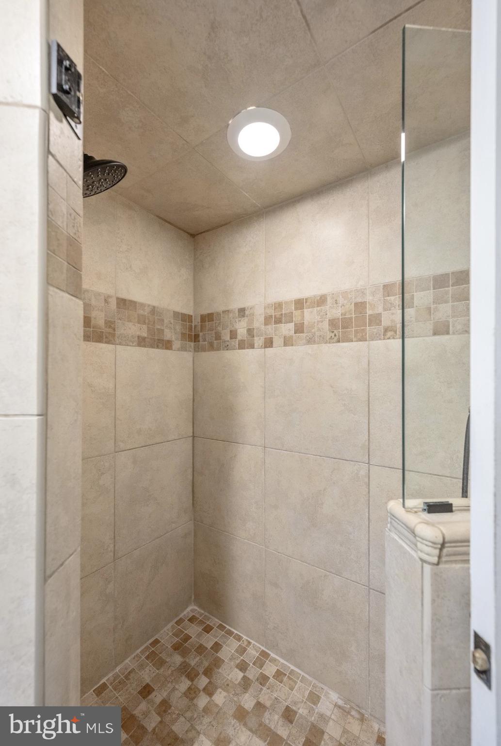 207 Anthony Wayne Drive Wayne, PA 19087 - Photo 33 of 47 a bathroom with a shower
