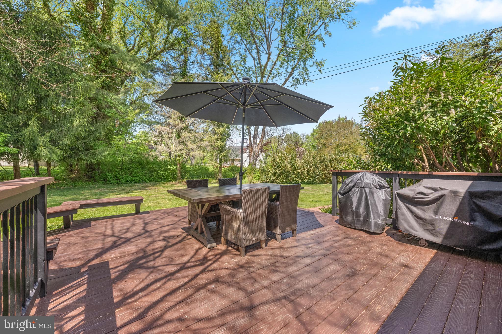 207 Anthony Wayne Drive Wayne, PA 19087 - Photo 38 of 47 a view of backyard with swimming pool and outdoor seating