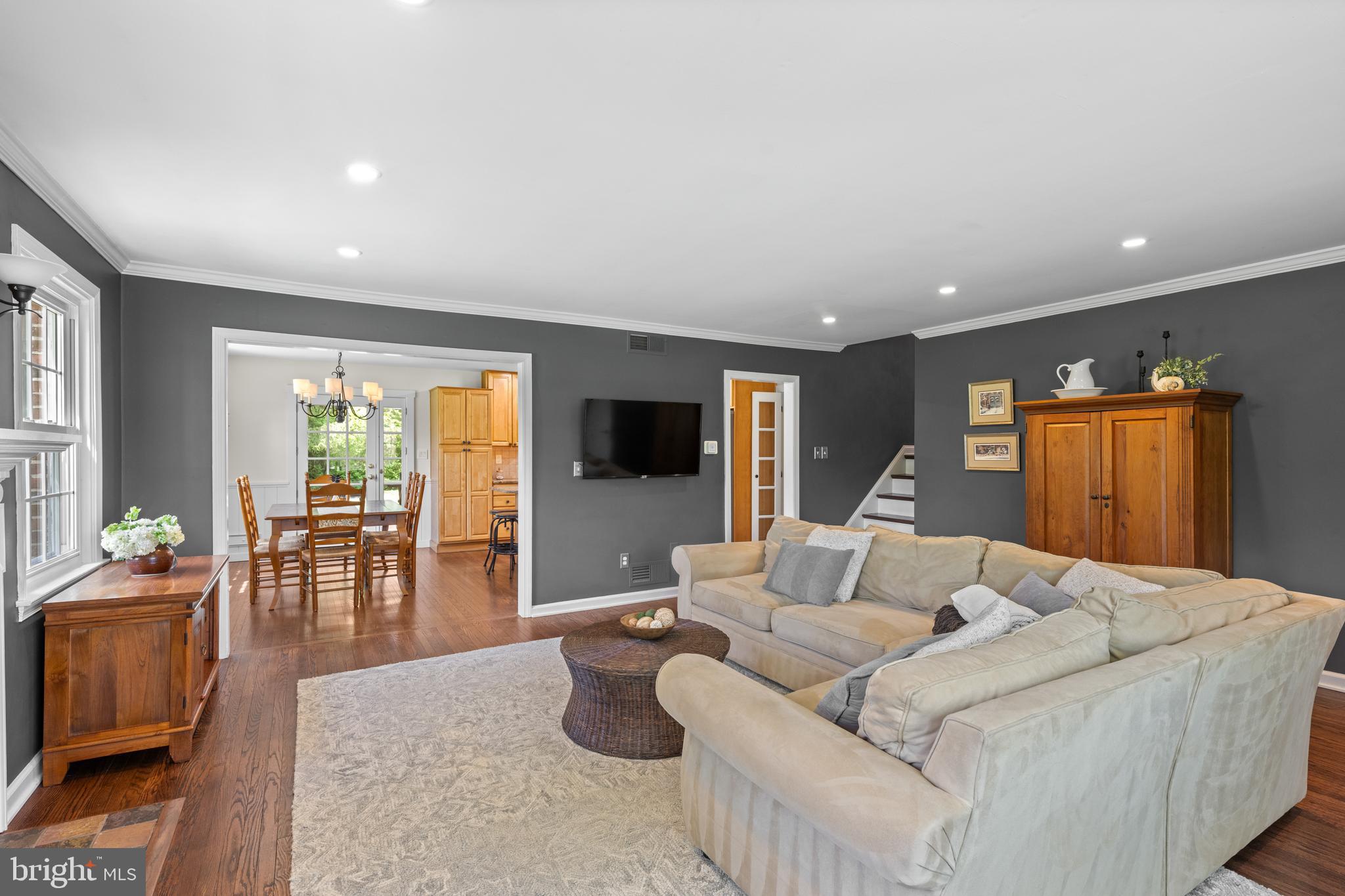 207 Anthony Wayne Drive Wayne, PA 19087 - Photo 6 of 47 a living room with furniture and a flat screen tv