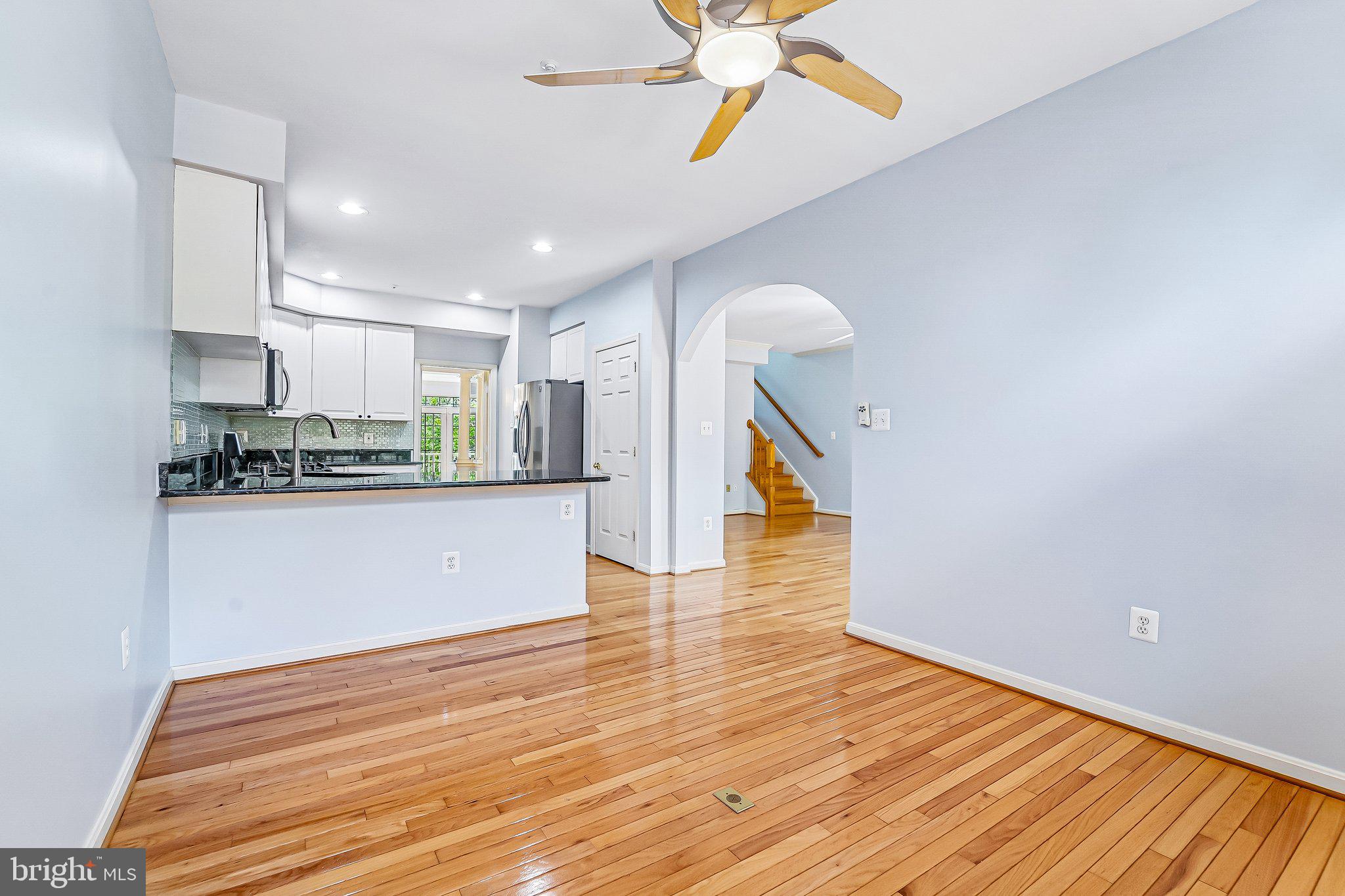 2422 Rippling Brook Road Frederick, MD 21701 - Photo 10 of 35 a view of kitchen with cabinets and wooden floor