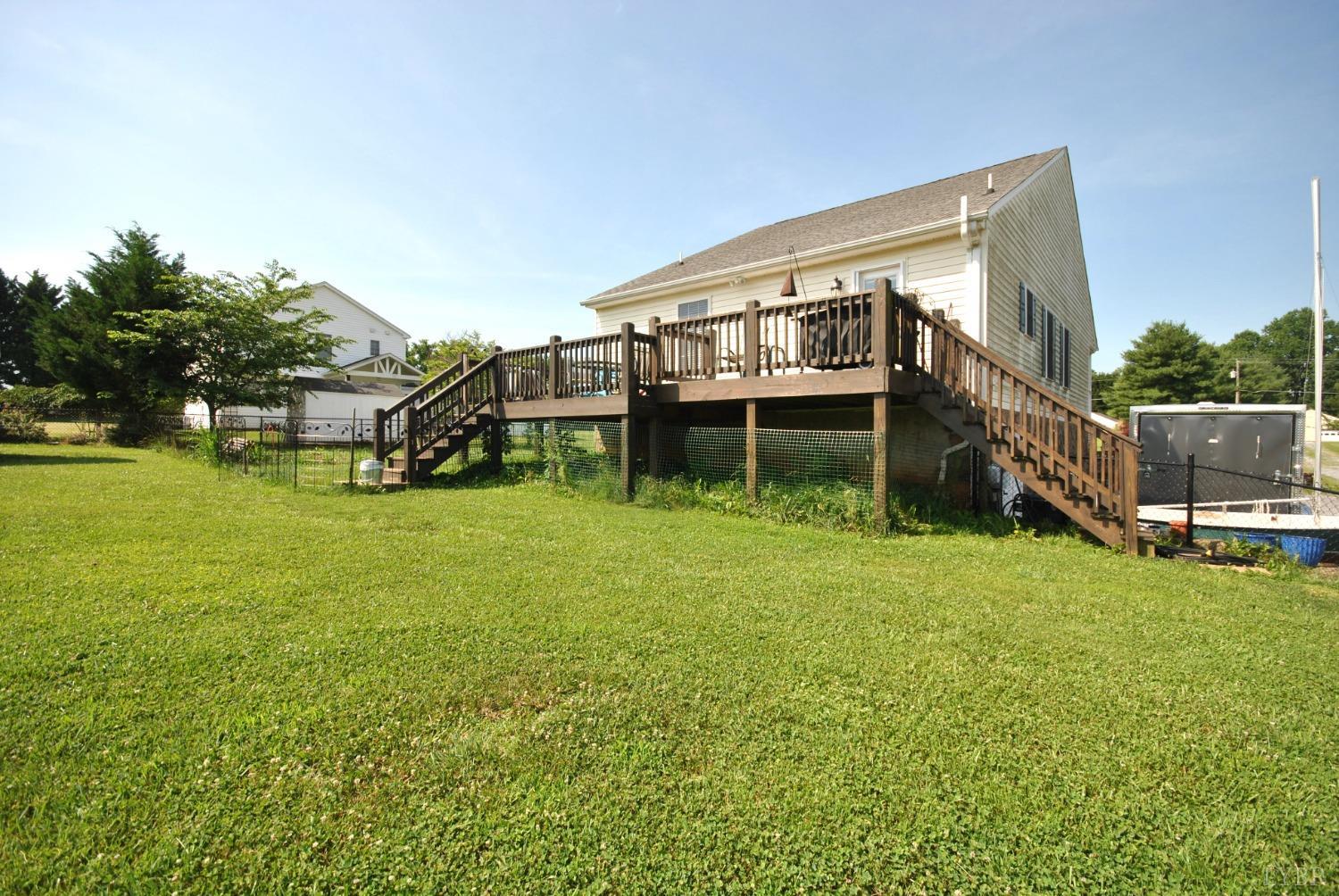 1795 Goode Road Goode, VA 24556 - Photo 54 of 67 a view of an house with backyard space and balcony