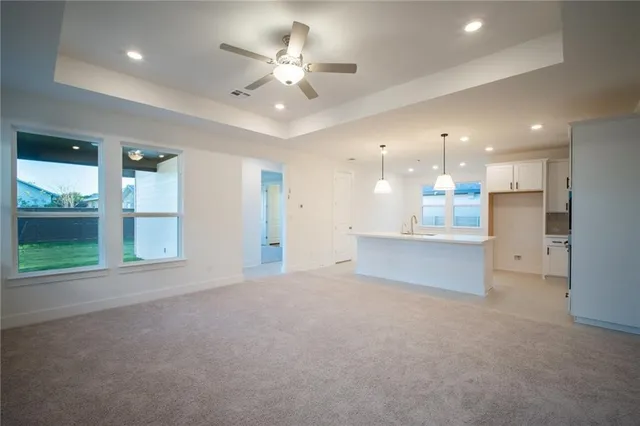 a bathroom with a double vanity sink mirror and shower
