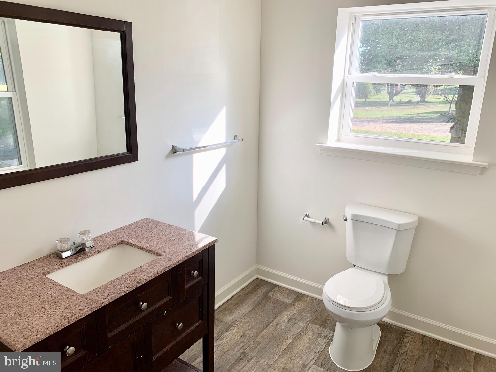 803 Philadelphia Road Joppa, MD 21085 - Photo 10 of 27 Large half bath main level