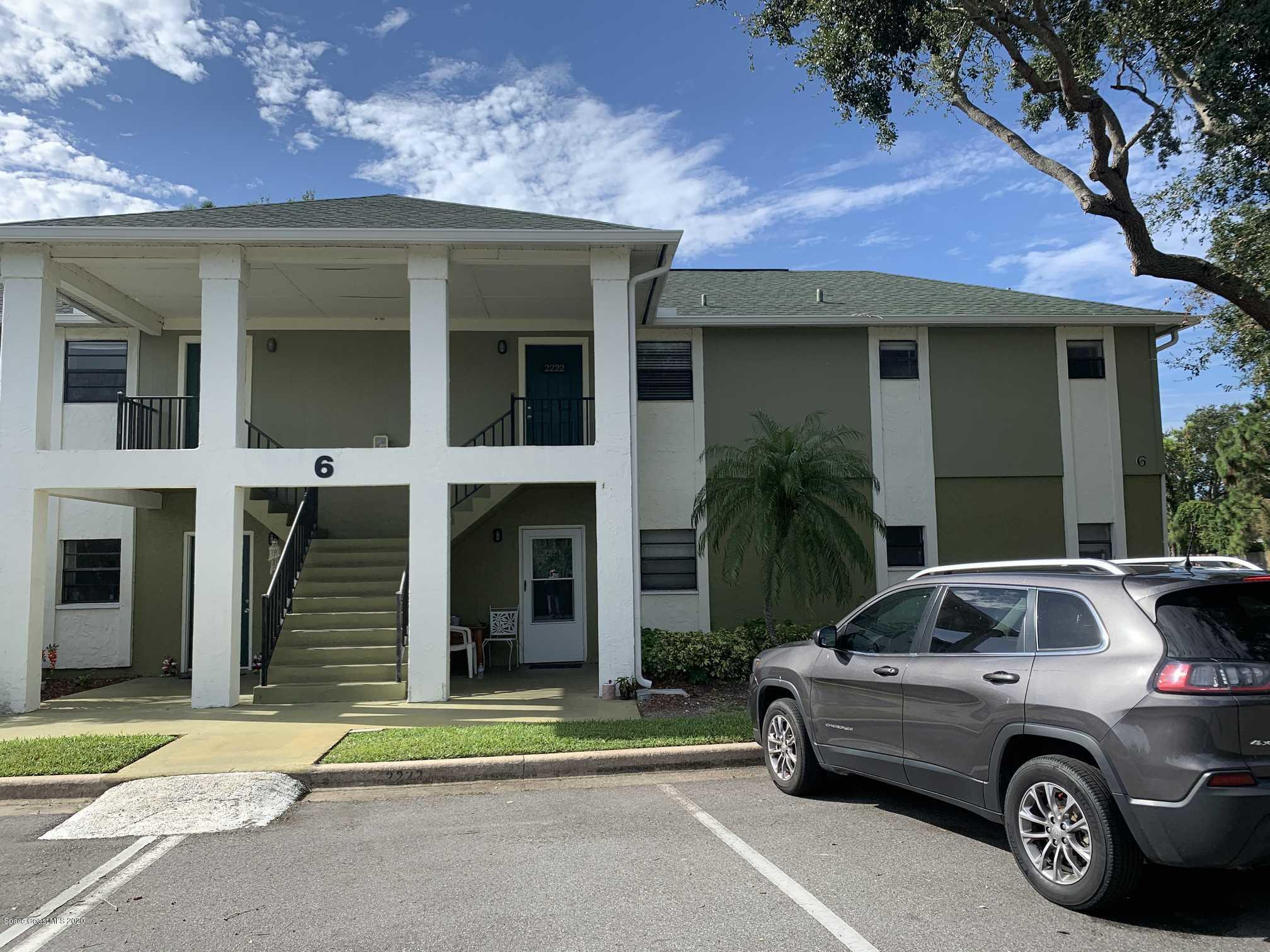 a car parked in front of a house