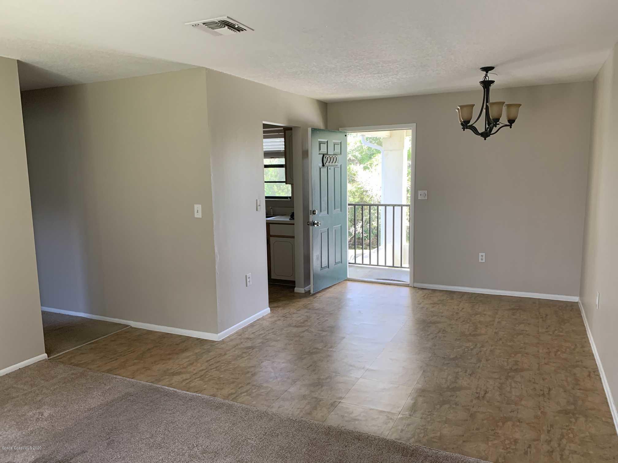 2222 Flower Tree Circle Melbourne, FL 32935 - Photo 17 of 17 a view of an empty room with a window