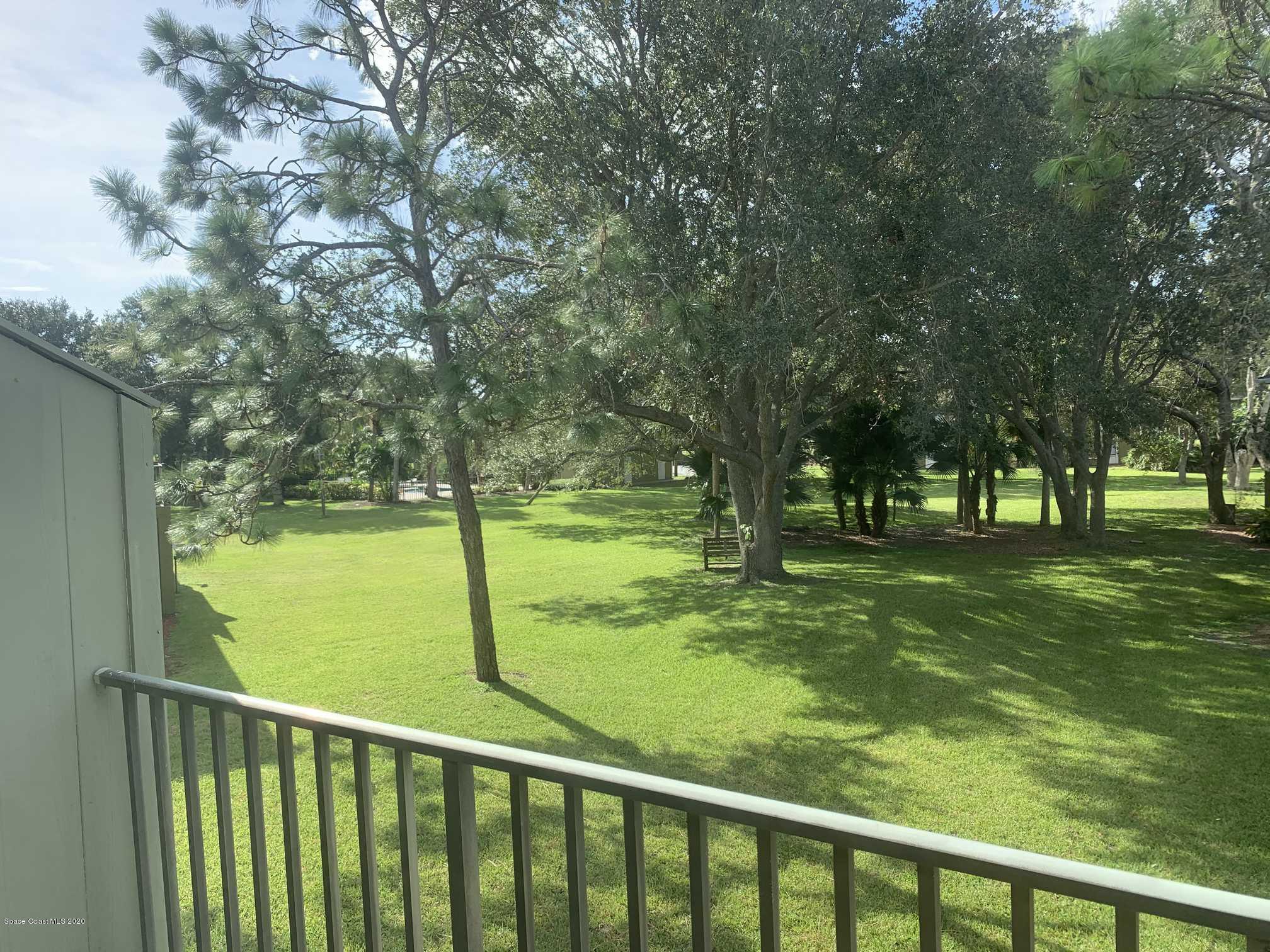 2222 Flower Tree Circle Melbourne, FL 32935 - Photo 4 of 17 a view of outdoor space with green field
