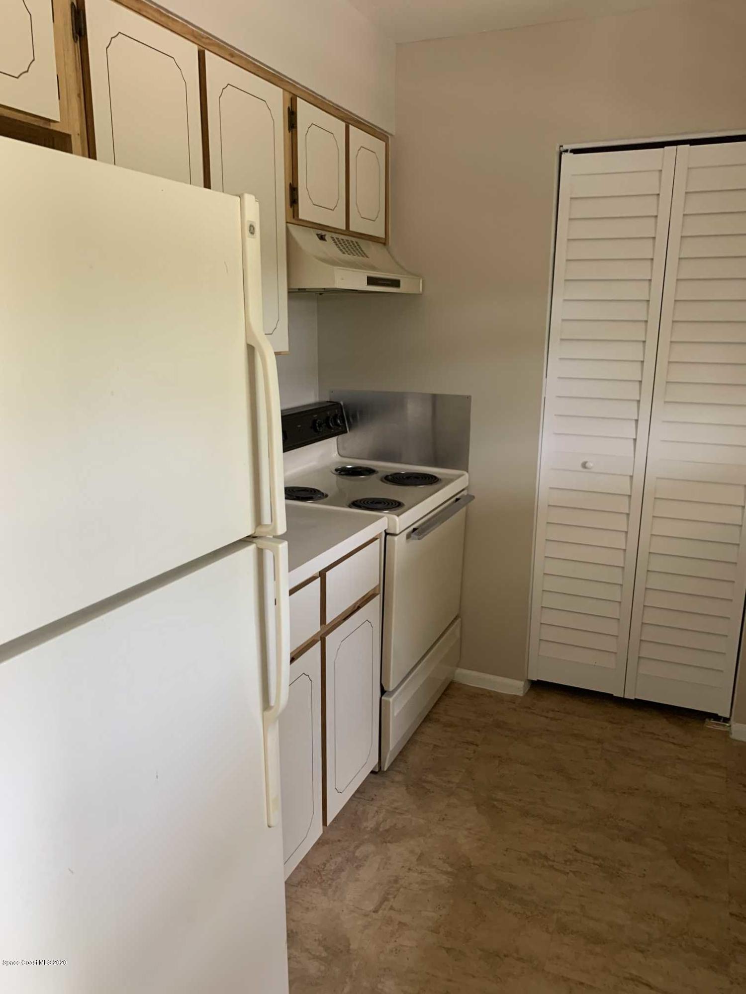 2222 Flower Tree Circle Melbourne, FL 32935 - Photo 6 of 17 a utility room with dryer and washer
