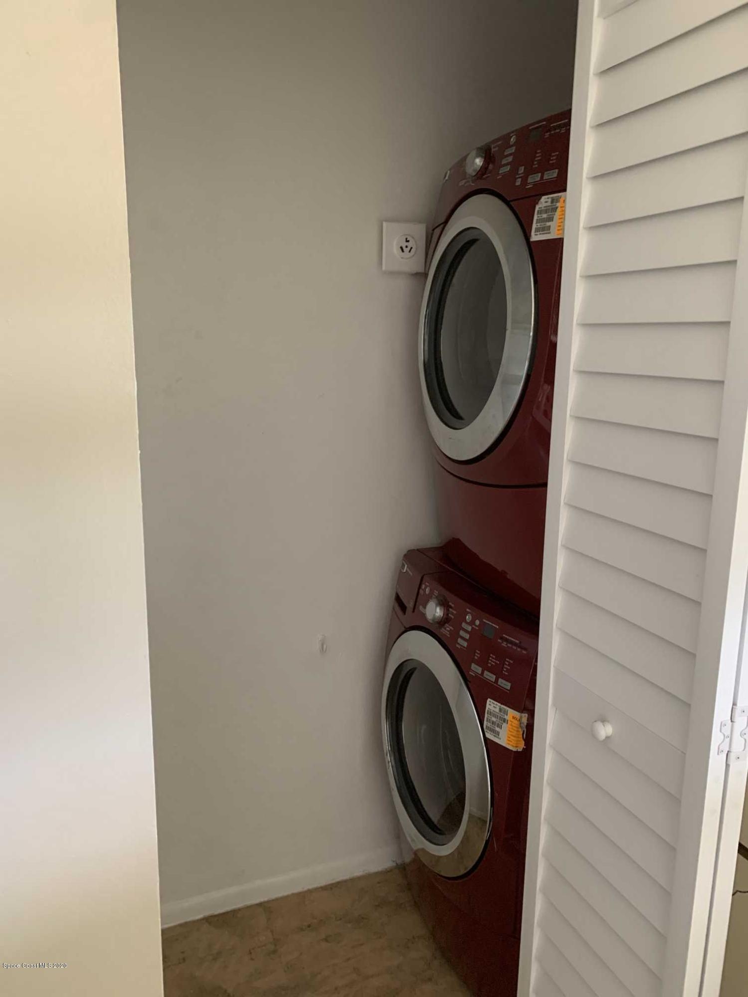 2222 Flower Tree Circle Melbourne, FL 32935 - Photo 7 of 17 a utility room with dryer and washer