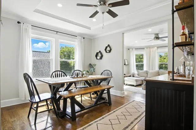 a view of a dining room with furniture window and outside view