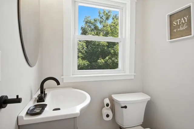 a bathroom with a sink and a toilet