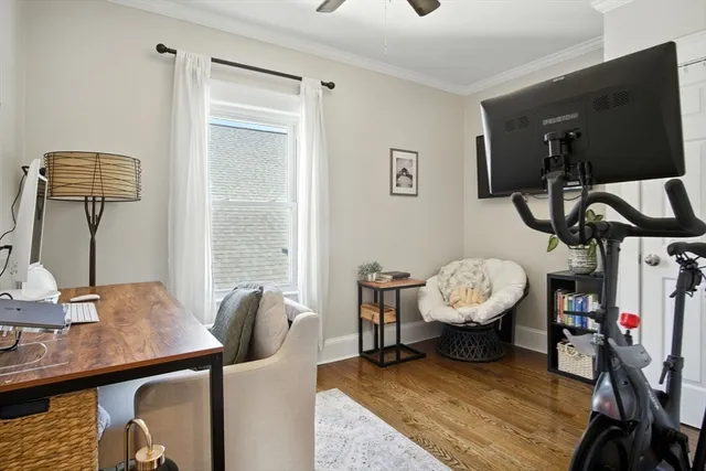 a living room with furniture and a window