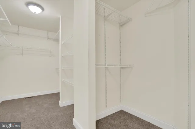 a view of a livingroom with a ceiling fan