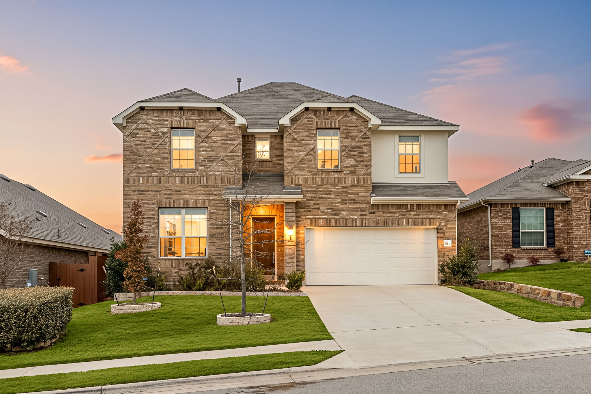 1098 Cherrystone Loop Buda, TX 78610 - Photo 2 of 37 a front view of a house with garden