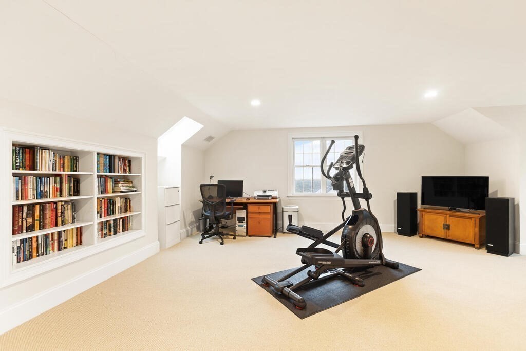 11 Kenilworth Road Arlington, MA 02476 - Photo 15 of 33 a view of a room with gym equipment