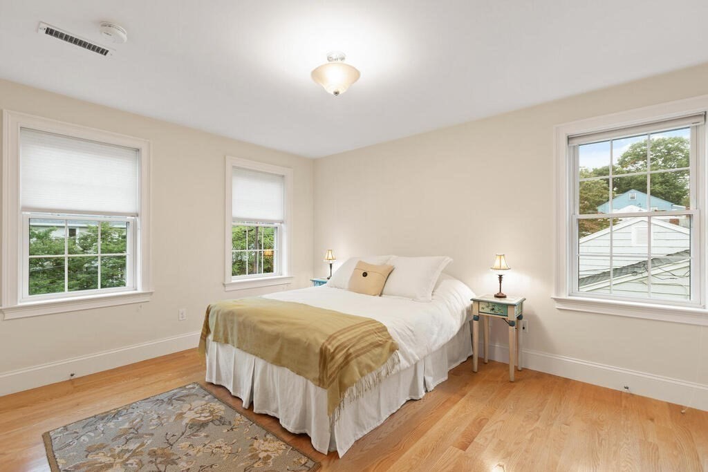 11 Kenilworth Road Arlington, MA 02476 - Photo 21 of 33 a bedroom with a bed and a window