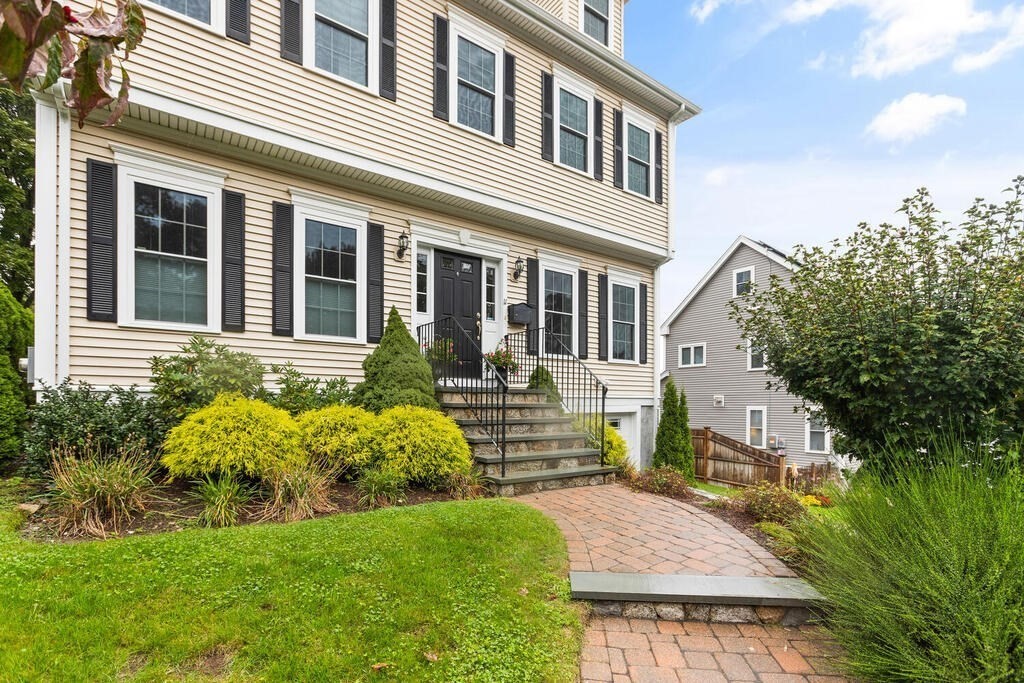 11 Kenilworth Road Arlington, MA 02476 - Photo 3 of 33 a front view of a house with garden