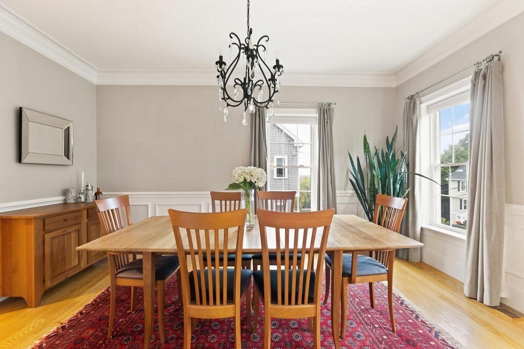 11 Kenilworth Road Arlington, MA 02476 - Photo 9 of 33 a view of a dining room with furniture window and wooden floor