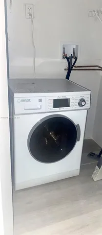 a view of a wooden deck with a garden