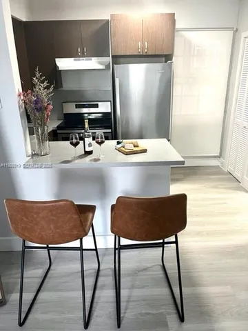 a workspace with furniture and window