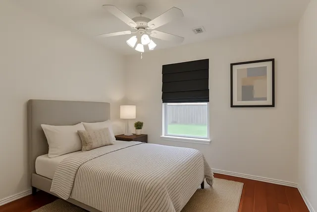 a bathroom with a tub sink and a mirror