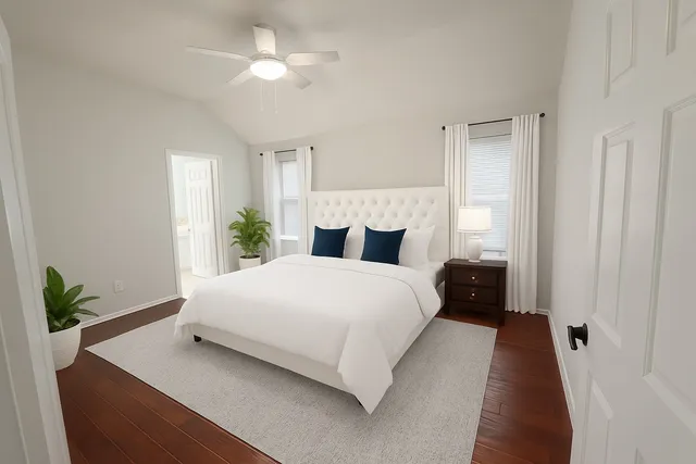 a view of a dining room with furniture and window