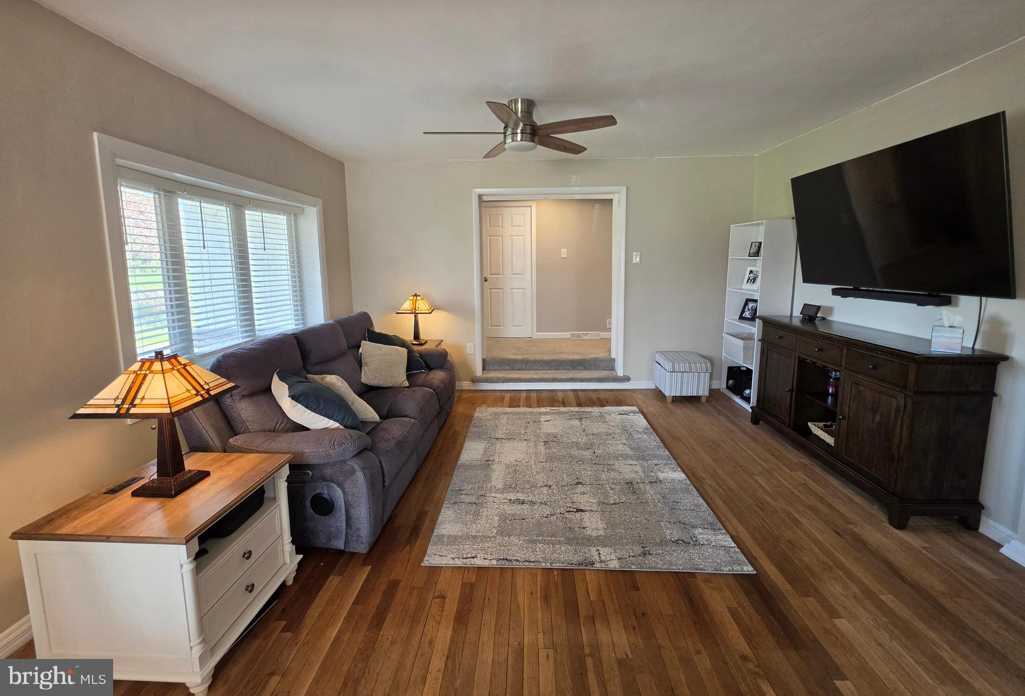 142 New Road Horsham, PA 19044 - Photo 11 of 38 a living room with furniture and a flat screen tv