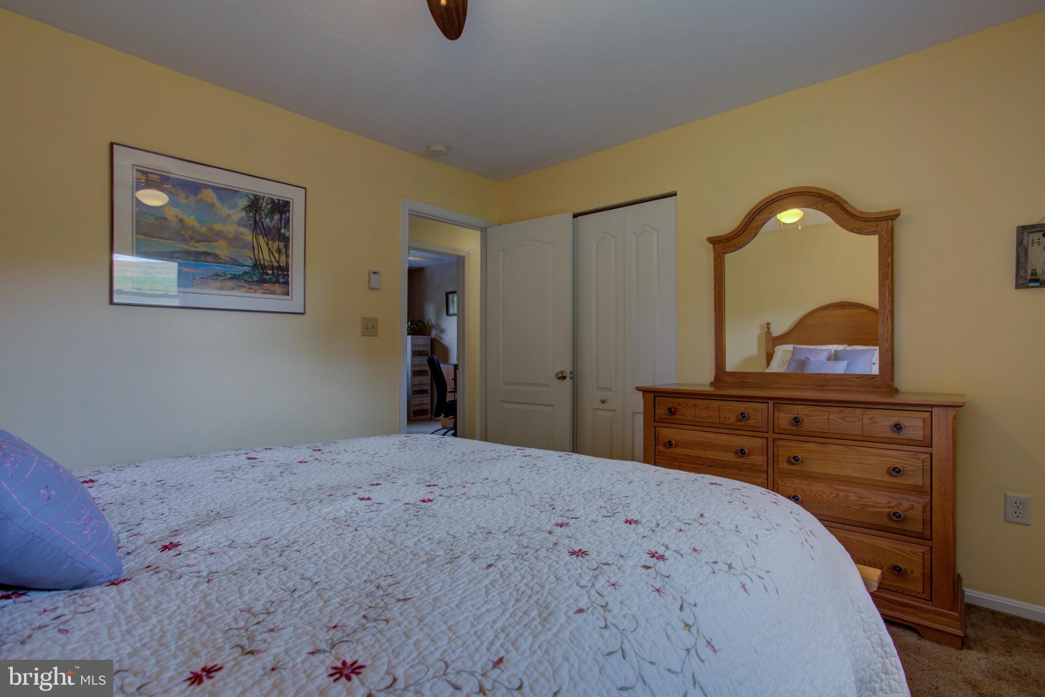 316 Long Lane Lititz, PA 17543 - Photo 24 of 49 a bedroom with a bed and a dresser