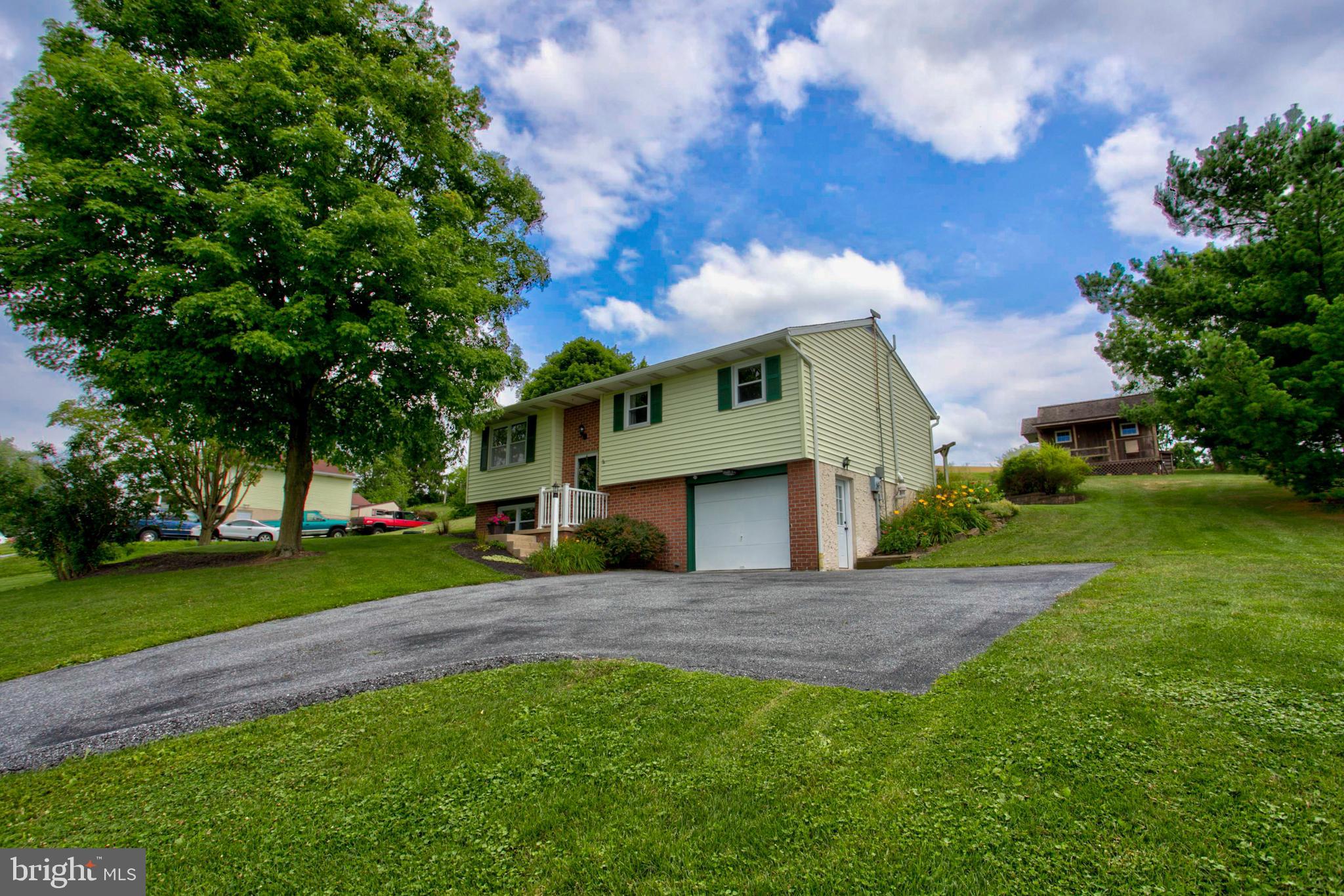 316 Long Lane Lititz, PA 17543 - Photo 5 of 49 a front view of a house with a yard