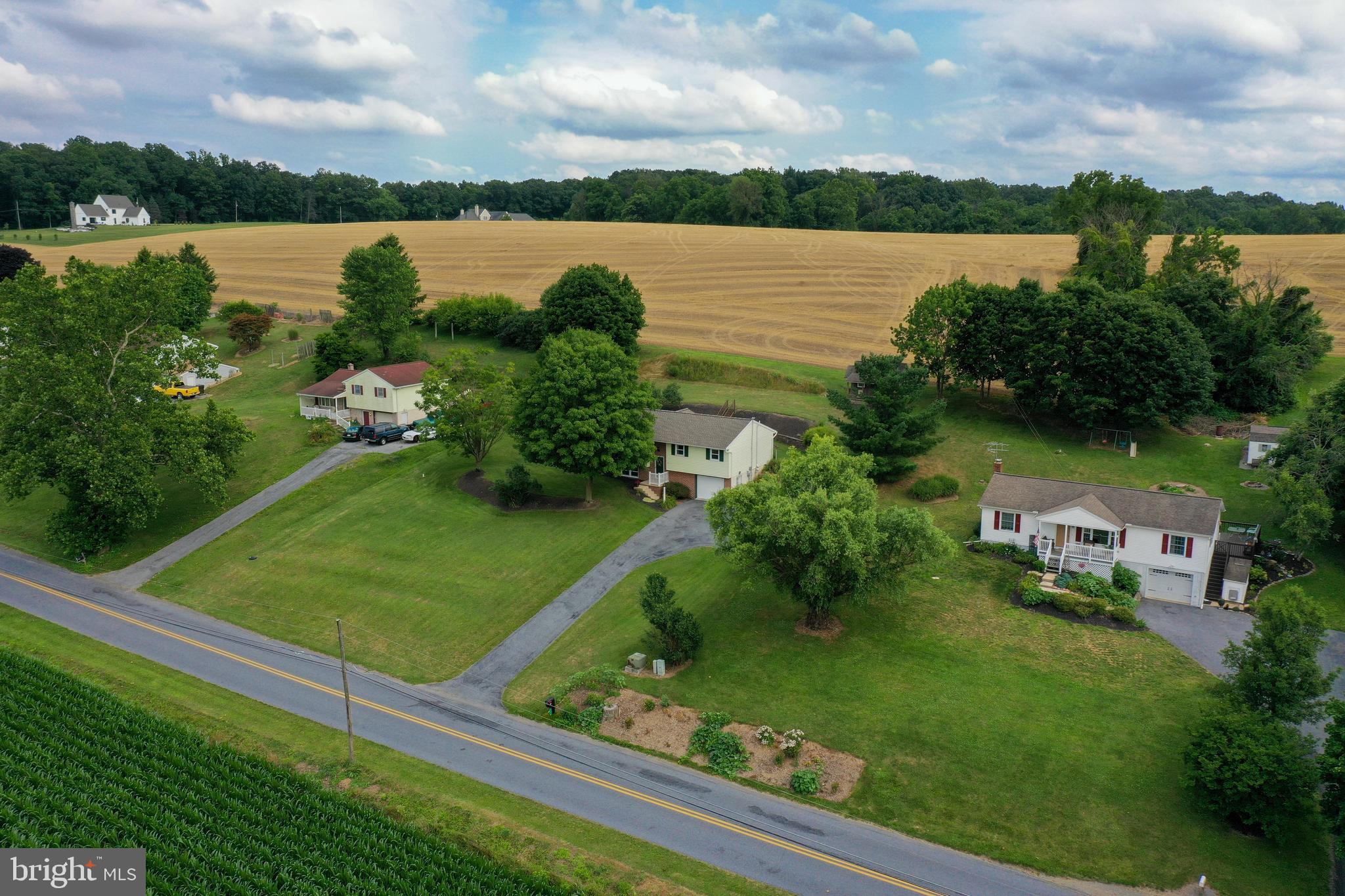 316 Long Lane Lititz, PA 17543 - Photo 43 of 49 a view of a lake with houses in the back