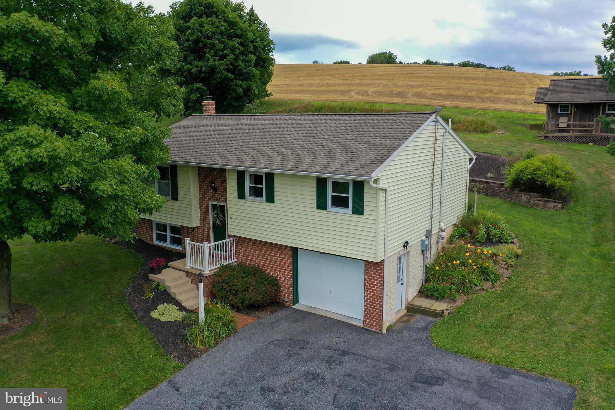 316 Long Lane Lititz, PA 17543 - Photo 10 of 49 a view of a house with backyard and garden