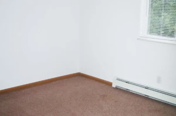 a view of a room with an empty space