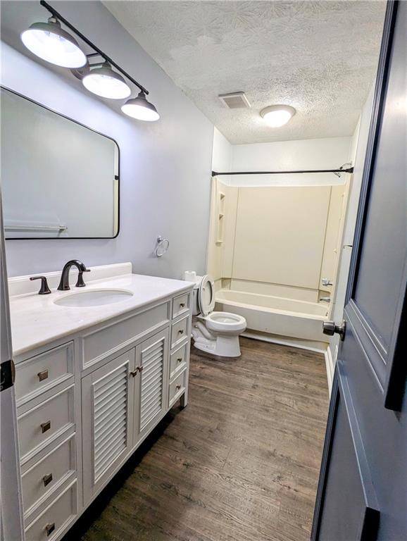 4990 Mountain Springs Way Stone Mountain, GA 30083 - Photo 8 of 9 a bathroom with a double vanity sink mirror and toilet