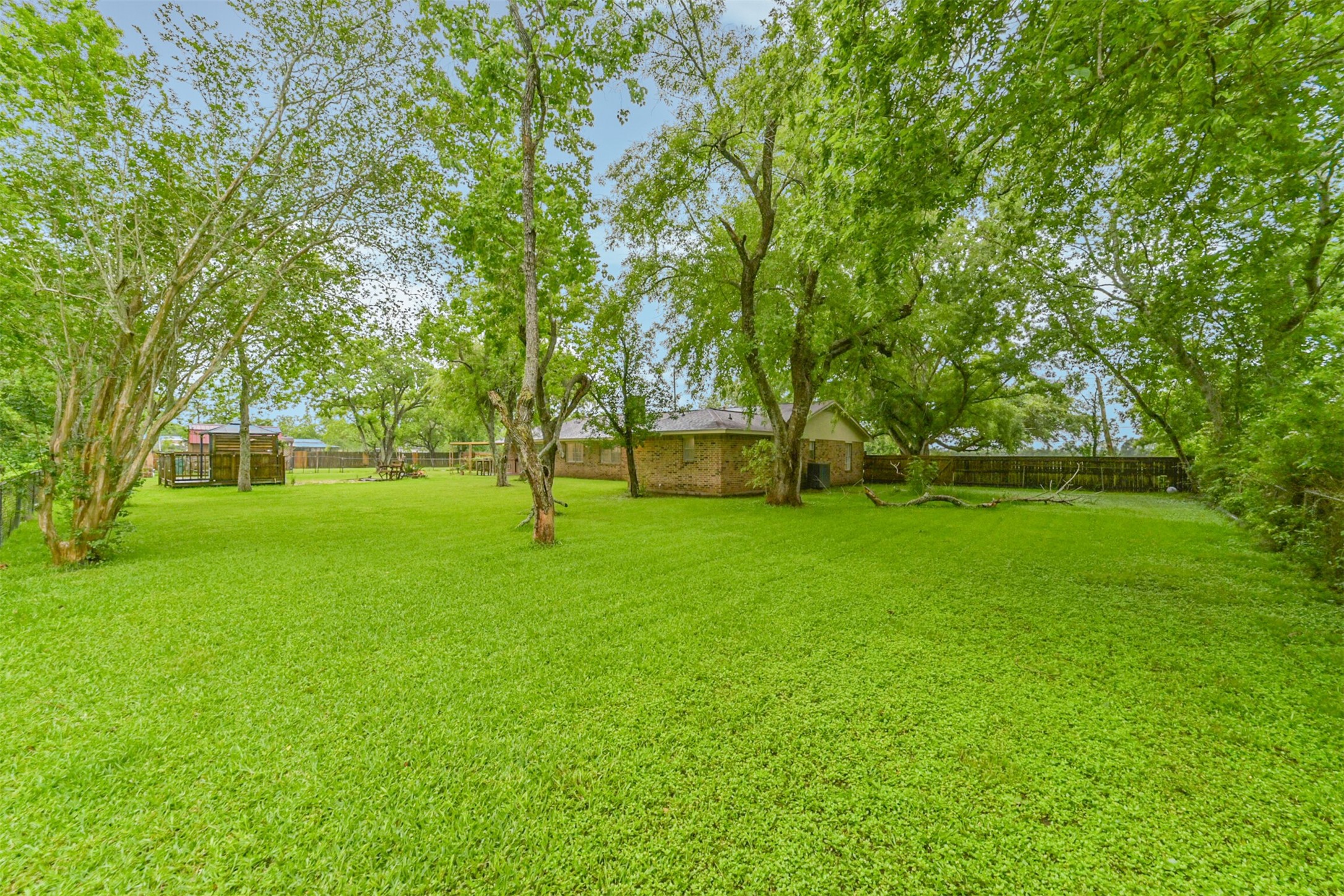 5403 Croix Road Manvel, TX 77578 - Photo 7 of 25 Expansive 1-acre lot with plenty of space for additions, outdoor entertaining, a workshop, pool or future expansion.