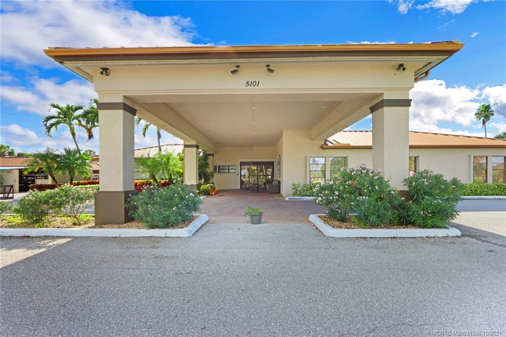 5443 Southeast Miles Grant Road, Unit D205 Stuart, FL 34997 - Photo 32 of 44 Entrance to Miles Grant CC Clubhouse, Restaurant, Tavern and Shops