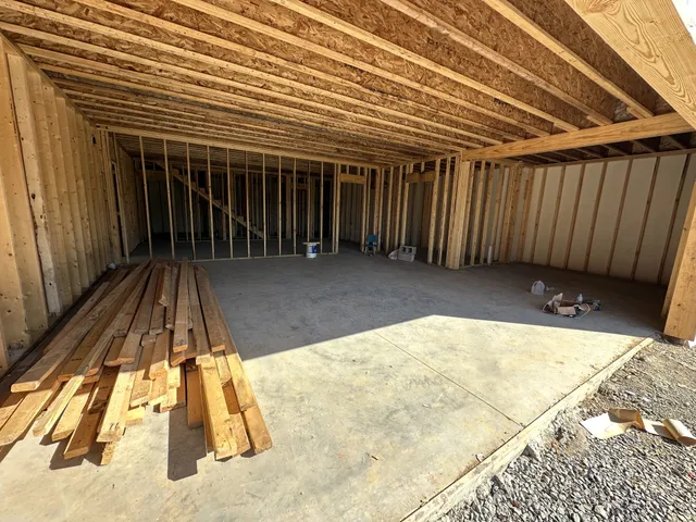 a view of backyard with a patio